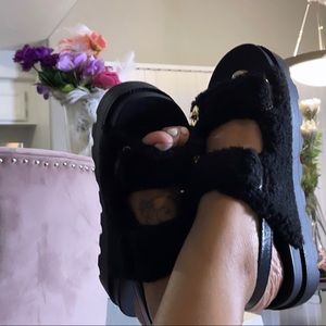 Shearling platform sandals